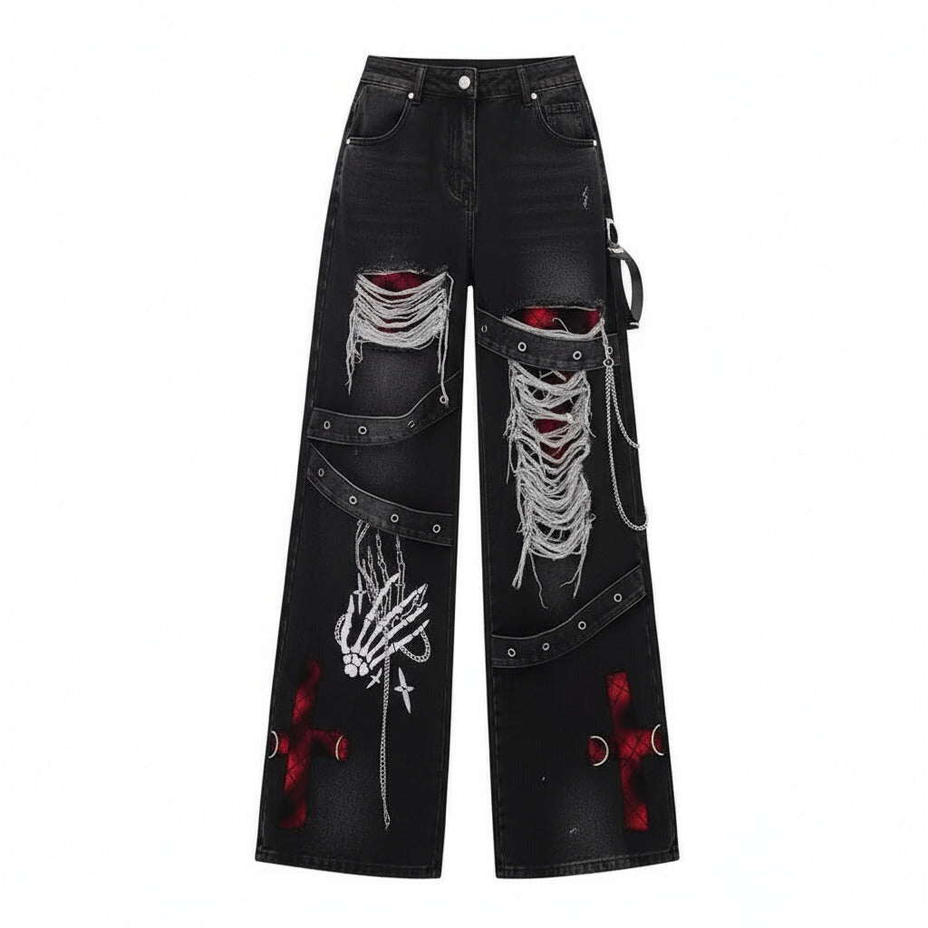 Pantalones vaqueros holgados para mujer góticos con rotos, tiras decorativas y parches rojos, son unos jeans retro punk alternativo.